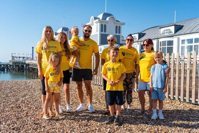 Esme (2), and family at South Parade Pier before setting off for their one mile charity walk.