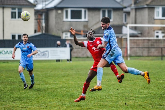 AFC Portchester (blue) v Bournemouth Poppies. Picture by Daniel Haswell