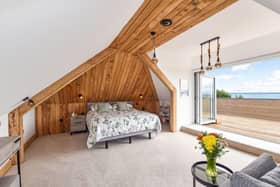 This property comes with six bedrooms, four bathrooms and five reception rooms. 

This home also comes with a heated pool, a gym and a large decked area. 

This home is on the market for offers over £3,000,000. 
This house is on the market with Jeffries & Dibbens Estate Agents. 

The listing says: "Comprising of approximately 7160 square feet, this impressive family home is situated on Hill Head Seafront and boasts panoramic views across the Solent to the Isle of Wight." 

The listing says: "The current owners have extensively renovated and extended the property, adding a heated swimming pool with deck, a fully equipped, sea-facing gym and a sleek office with vaulted ceilings."

This property is near public transport links including Fareham train station and Gosport Ferry Terminal. 
There are also local schools close by including Crofton Hammond Junior School and Crofton Hammond Infant School.
