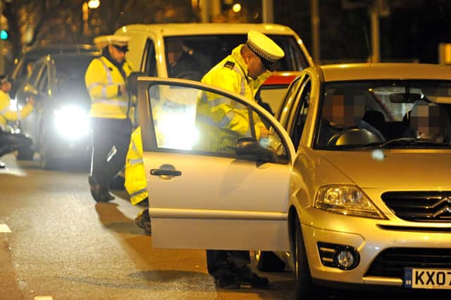 Dozens of people were drink driving casulaties in Portsmouth over the last three years. Pictured is Hampshire traffic police stopping drivers as they left Portsmouth at the entrance to Unicorn Gate in the city. Picture Ian Hargreaves  (151954-20).