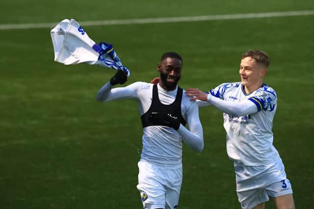Mo Faal celebrates with Joe Newton after scoring his second against Braintree. Picture by Dave Haines