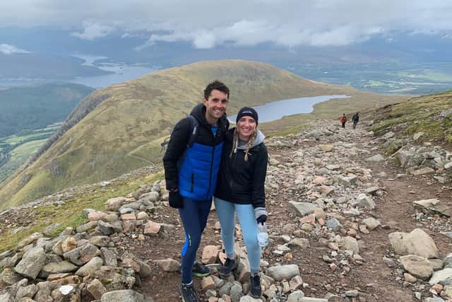 Jack Oates and girlfriend Kelly Davis pictured climbing Ben Nevis, the UK's highest mountain.