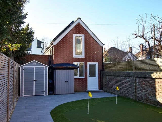 This property has 12 solar panels with backup battery storage providing hot water in summer months and it also is equipped with a putting green in the garden.