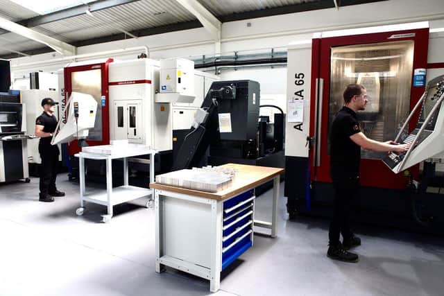 Staff at Havant-based engineering firm Monolution manufacture components for ventilators to be used by the NHS to treat coronavirus patients.