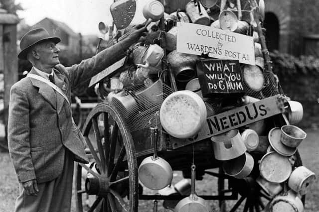 This handcart at Gosport was piled high with aluminium items after the town's ARP wardens made their own collection in July 1940. Picture: The News PP513