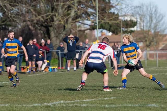 Gosport & Fareham's hat-trick hero Robert Ellis, right, lays off to two-try scorer Dom Philo Picture: Martin Burnett