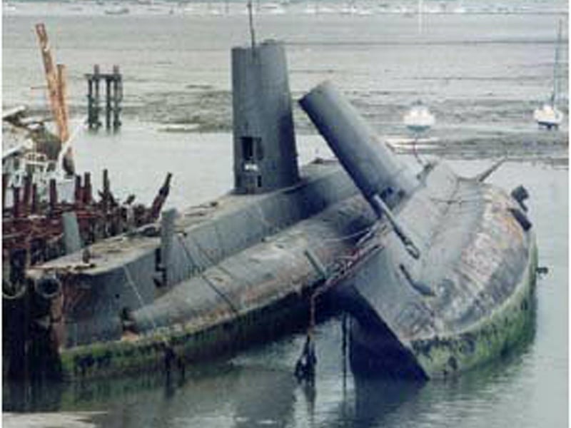 The former HMS Otus (left) supporting the what was believed to have been the Onslaught in John Pounds scrapyard.