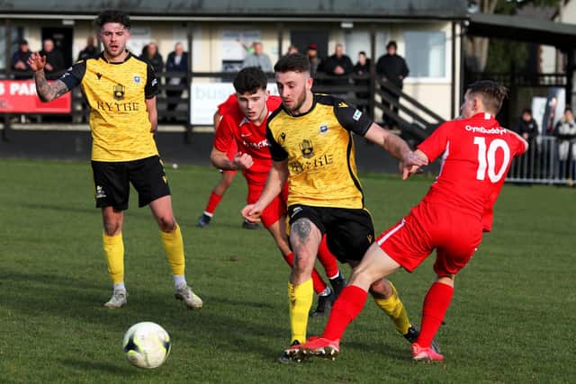Harry Sargeant (Baffins, yellow) in action at Horndean
Picture: Sam Stephenson.