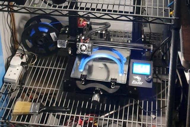 Caption: The volunteers have been using 3D printers that can produce 10 visor headbands in less than nine hours.