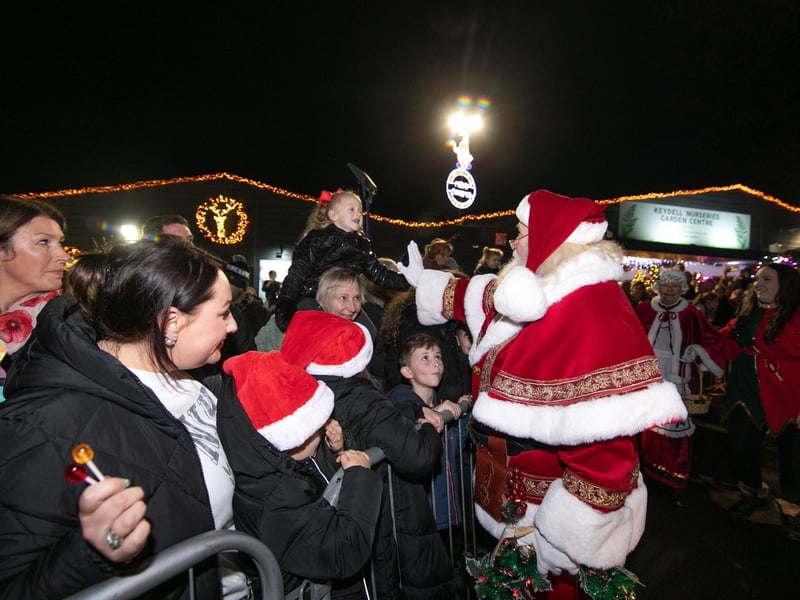 Father Christmas meeting visitors at the grotto.