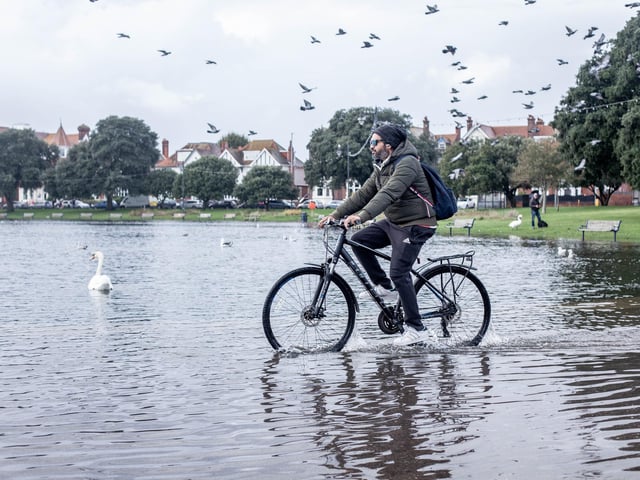 Flooding in Portsmouth on Monday, October 30 2023
Pictured: A man rides his bike by the flooded Canoe Lake, Southsea.
Picture: Habibur Rahman