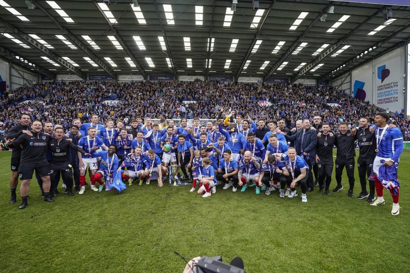The perfect picture - the jubilant Pompey squad, management team and backroom staff in front of the Fratton End
