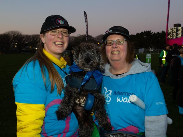 Victoria Nicholls, Ivy Casey and Beastie the Dog came to Castle Field, Southsea to take part in the Alzheimers Society Glow Walk on Friday evening. Photos by Alex Shute