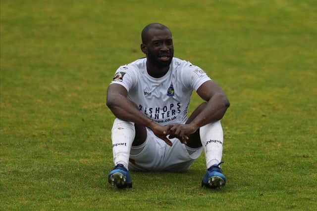 The face of semi-final defeat - Hawks midfielder Bedsente Gomis at the final Whistle. Photo by Dave Haines