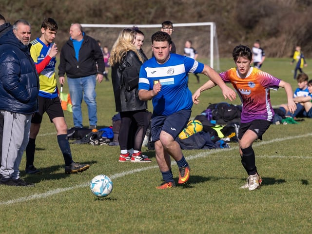 Bulldog (blue) v King George Rovers. Picture: Mike Cooter