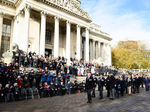 Pictured is: Veterans are cheered and clapped off the parade

Picture: Keith Woodland (121121-233)