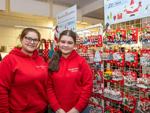 The crowds braved the wind and rain to watch the Christmas lights being switched on in Fareham highstreet on Saturday evening, while some of the entertainment was moved into the shopping centre.Pictured - Mia and Shelby, 14 from Personalised Decorations in the Pop Up MarketPhotos by Alex Shute