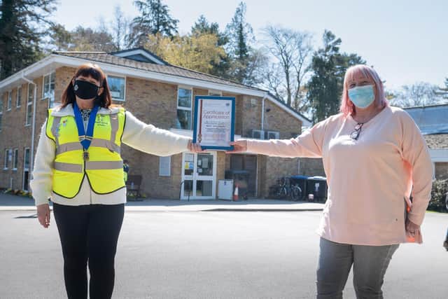 Swanwick Lions pe esident Net Cooper, left, with Brook Lane Practice manager Carolyn Hill. Picture by: Rob Dunning