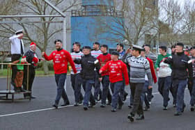 Christmas cheer was in full flow at HMS Sultan over the past week.
Pictured: Sailors wearing festive jumpers take part in a charity divisions event on the base's parade square.