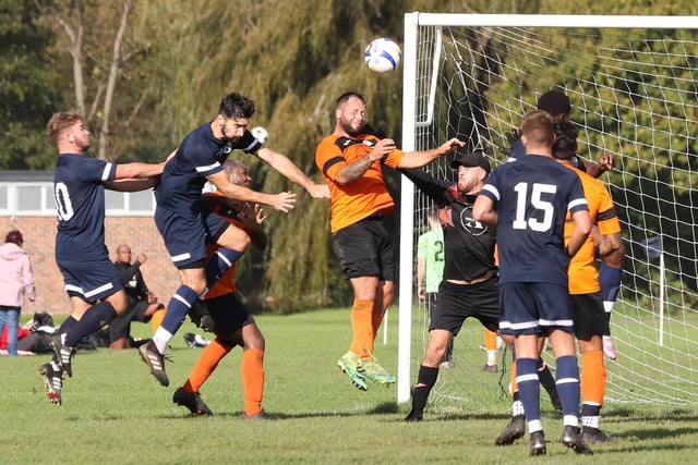 Mother Shipton (orange/black) v North End Cosmos. Picture by Kevin Shipp