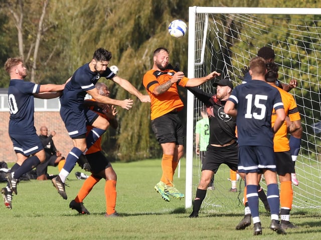 Mother Shipton (orange/black) v North End Cosmos. Picture by Kevin Shipp