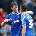 Match-winner Adam Webster celebrates with Jed Wallace after Pompey's victory over Hartlepool in April 2014. Picture: Joe Pepler