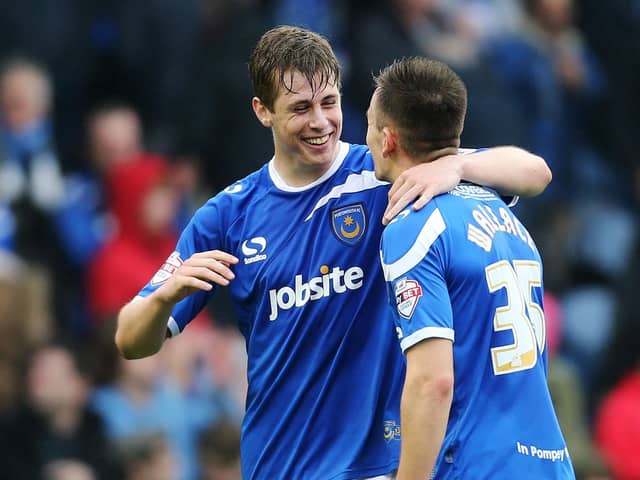 Match-winner Adam Webster celebrates with Jed Wallace after Pompey's victory over Hartlepool in April 2014. Picture: Joe Pepler