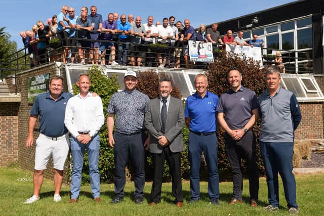 Invited guest players for Portsmouth Golf Club's 50th anniversary celebration event, from left: Ryder Cup 1991 player Steve Richardson, former Portsmouth GC professional Jason Banting, James Moore, current club captain Ian Roper, James Green and ex-Portsmouth GC pro player Robert Brown. Club members gather on the balcony above. Picture: Keith Woodland (140521-7)