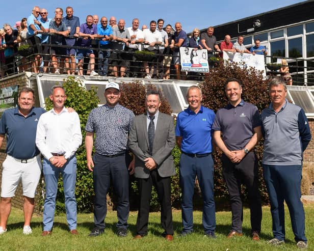 Invited guest players for Portsmouth Golf Club's 50th anniversary celebration event, from left: Ryder Cup 1991 player Steve Richardson, former Portsmouth GC professional Jason Banting, James Moore, current club captain Ian Roper, James Green and ex-Portsmouth GC pro player Robert Brown. Club members gather on the balcony above. Picture: Keith Woodland (140521-7)