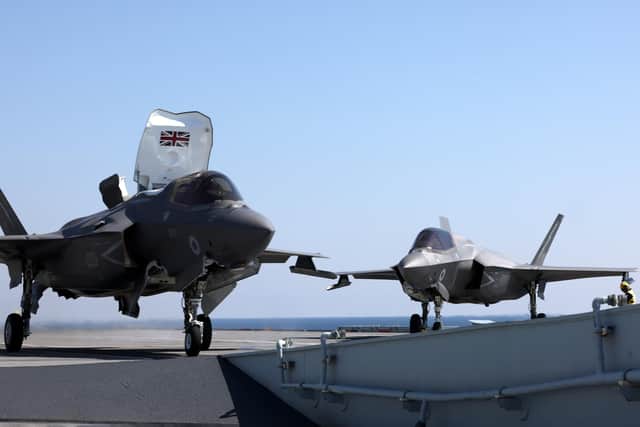 RAF jets from 617 Squadron have continued their work on board HMS Queen Elizabeth while the damaged American jet was repaired. Photo: LPhot Unaisi Luke