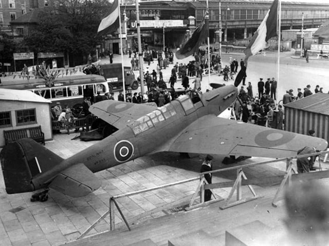 This marvellous shot taken from the steps of the Guildhall shows a fighter on display on the edge of Guildhall Square when it was on show for Wings for Victory Week in 1943.