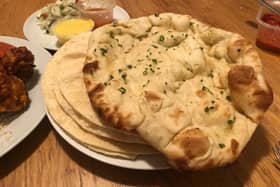 A chilli naan and poppadoms