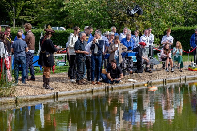 Racing participants with their makeshift model boats at Lakeside 5000, Hilsea
