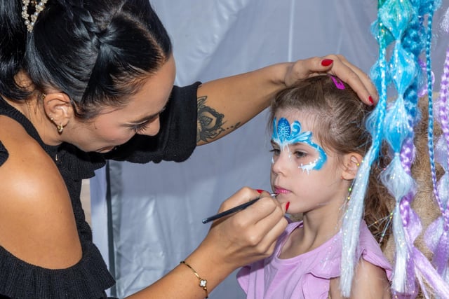 Genevieve Green, 7, gets her face painted at Port Solent 999 Day.