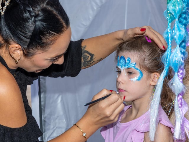 Genevieve Green, 7, gets her face painted at Port Solent 999 Day.