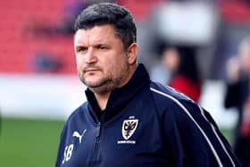Lyle Taylor believes AFC Wimbledon's failure to replace Pompey coach Simon Bassey was they key reason why Mark Robinson was sacked as Wombles boss.