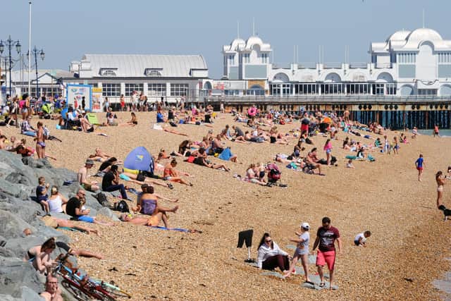 People on the beach in Southsea. Picture: Sarah Standing (210520-2502)