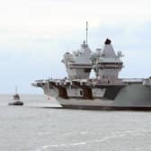 HMS Queen Elizabeth returning to Portsmouth.

Picture: Sarah Standing (040620-3867)