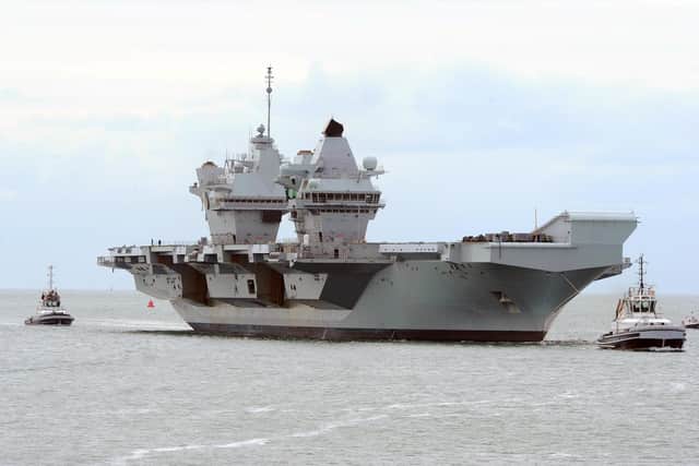 HMS Queen Elizabeth returning to Portsmouth.
Picture: Sarah Standing (040620-3867)