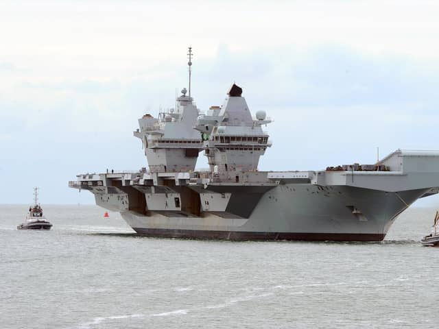 HMS Queen Elizabeth returning to Portsmouth.

Picture: Sarah Standing (040620-3867)