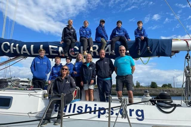 Crew onboard the Challenge yacht. 