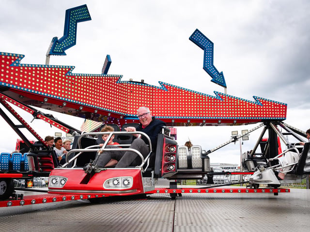 Pictured is: Enjoying one of the funfair ridesPicture: Keith Woodland (080621-26)