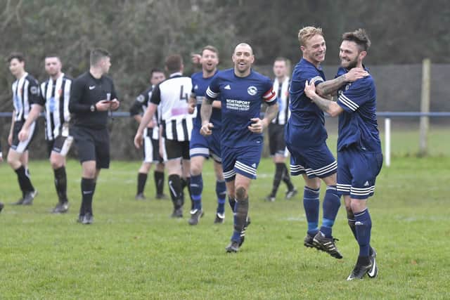 Alex Miroy, far right, celebrates a goal for Paulsgrove against Hayling during their 2017/18 double-winning season. Picture: Neil Marshall