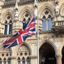 A union flag flies at half-mast