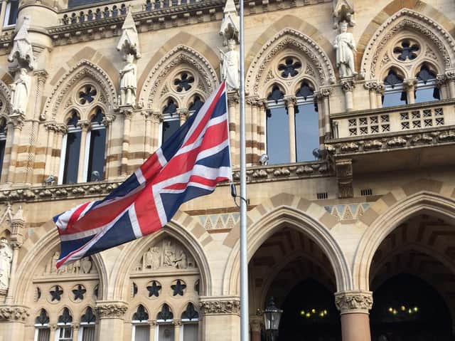 A union flag flies at half-mast