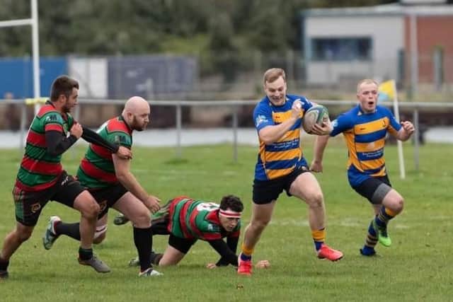 Rob MacKinnon, second right, ran in two tries for Gosport & Fareham at Fordingbridge. Picture: Martin Burnett