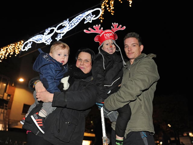 The Cascades Shopping Centre in Commercial Road, Portsmouth, when they turned on their Christmas lights back in 2013.  Pictured is: Kaileigh Wythe (28) with her partner Toby Barber (28) and their two sons (left) Max Barber-Wythe (13 months old) and Oakley Barber-Wythe (5) from Southsea, at the Christmas lights switch on. Picture: Sarah Standing (133202-8967)