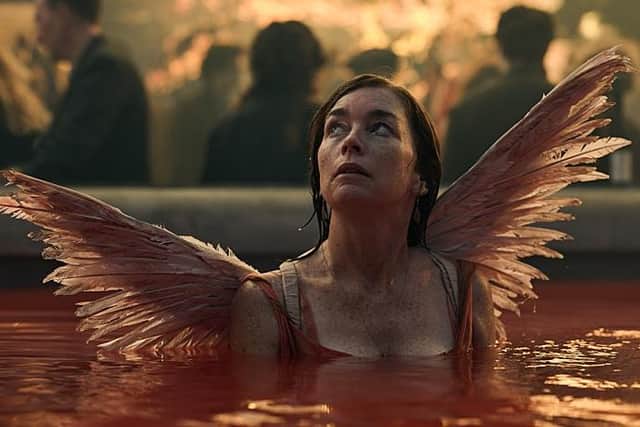 Crime kingpin Kate (Julianne Nicholson) is reborn in the fountains of Trafalgar Square (Picture: BBC/Bad Wolf/Kevin Baker)