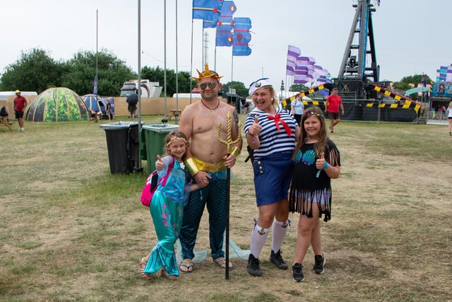 Alexanda, Anna, Agata and Stan Cieslick in fancy dress for the isle of wight festival, saturday 18th June 2022.
