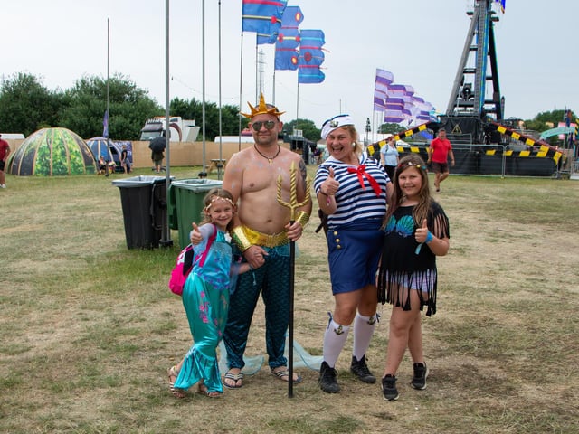Alexanda, Anna, Agata and Stan Cieslick in fancy dress for the isle of wight festival, saturday 18th June 2022.